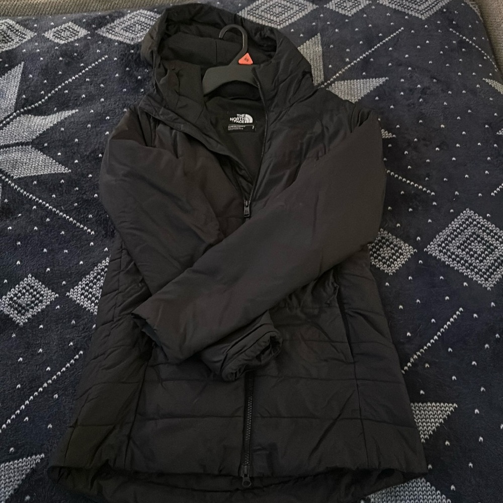 The North Face Woman’s Sm Winter Jacket with Hood.